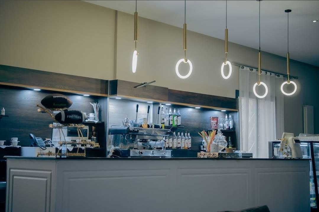 Espresso bar with sculptural pendant lighting